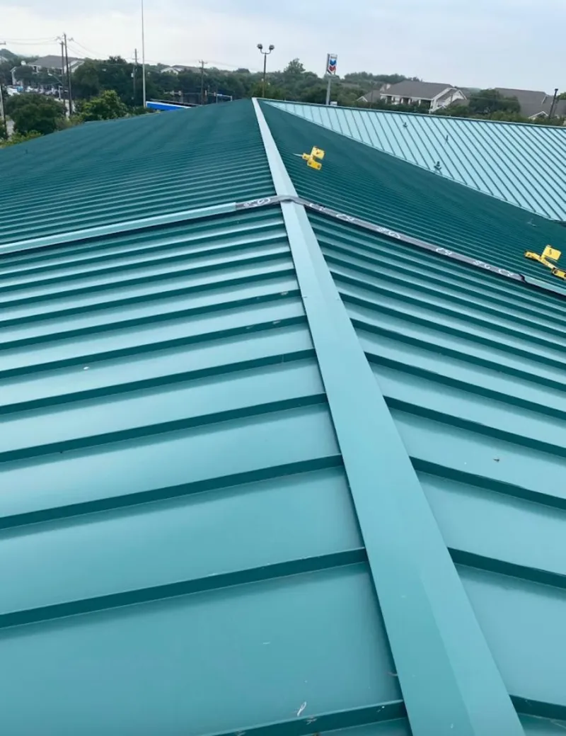Green commercial metal roof ridge and valley for Metal Roof Repair in Muscatine